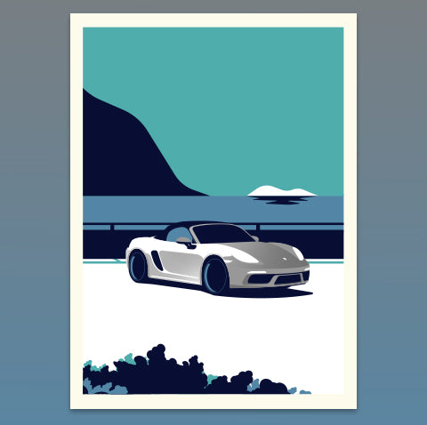 Sedan car on a road with a scenic background